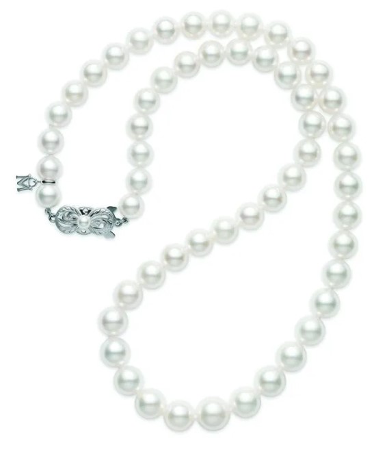 Mikimoto Graduated Cultured Pearl Necklace  18 Inches Long  Having White Pearls Measuring 9 X 7mm Each  A-1 Quality And An 18 Karat White Gold Signature Clasp.